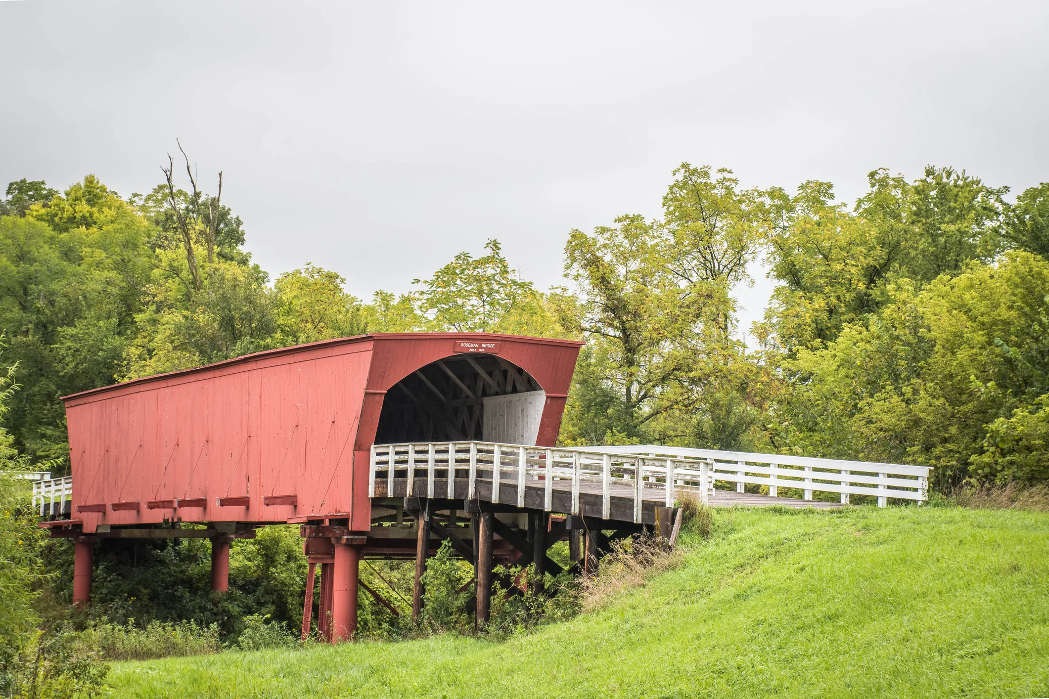 Covered bridge with rolling hill near Des Moines Iowa