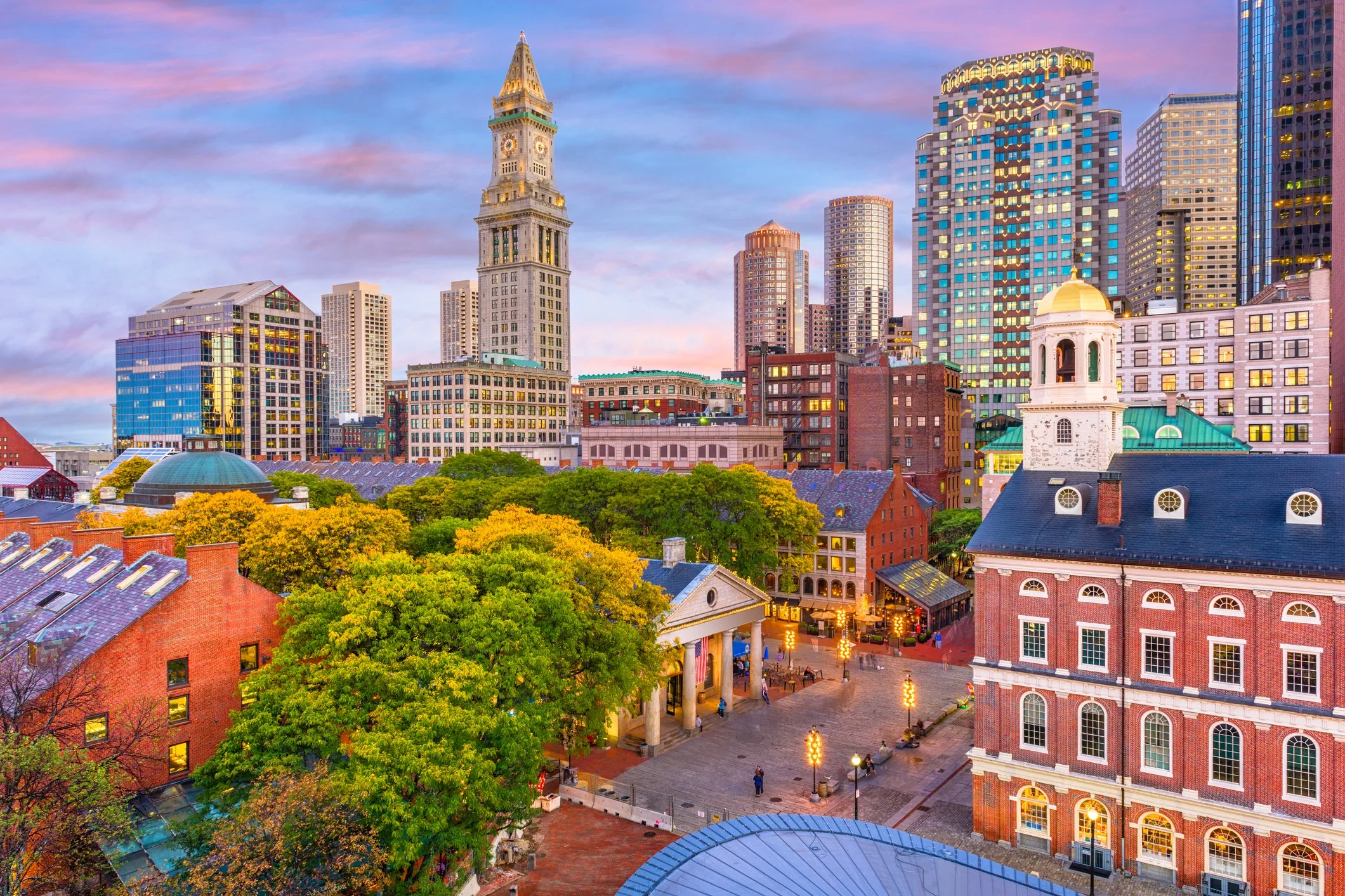 Boston, Massachusetts, USA Skyline. Boston, Massachusetts, USA downtown skyline over Faneuil Hall and Quincy Market at dusk.