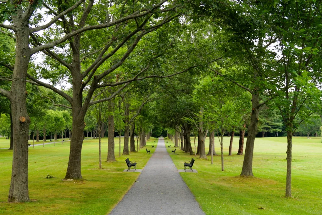 Central alley, lined with benches, in the Capitol Park, Augusta, ME, USA